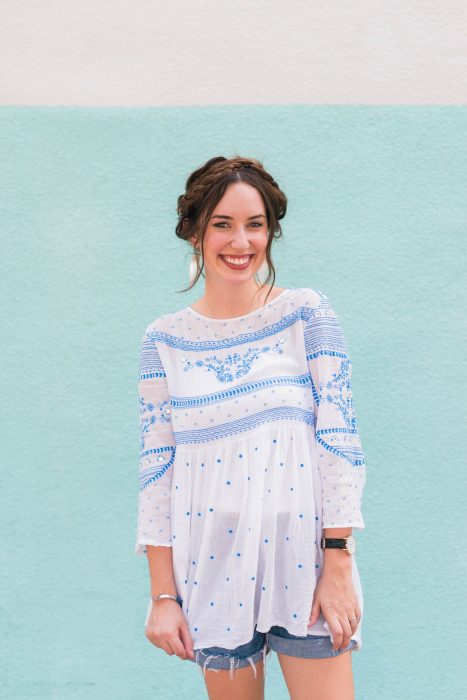 A super simple messy crown braid tutorial that takes less than 10 minutes, wearing Anthropologie's blue and white Meadowbrook Blouse
