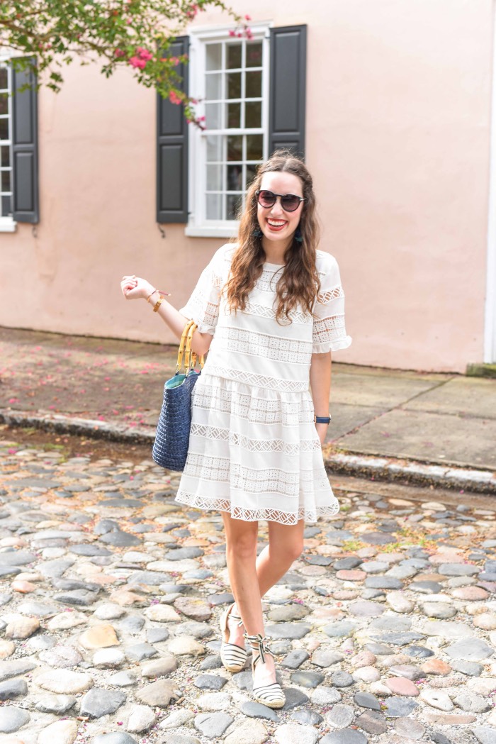 Styling the Clarimond White Lace Dress from Anthropologie and KAS New York with espadrilles and a straw tote in Charleston.