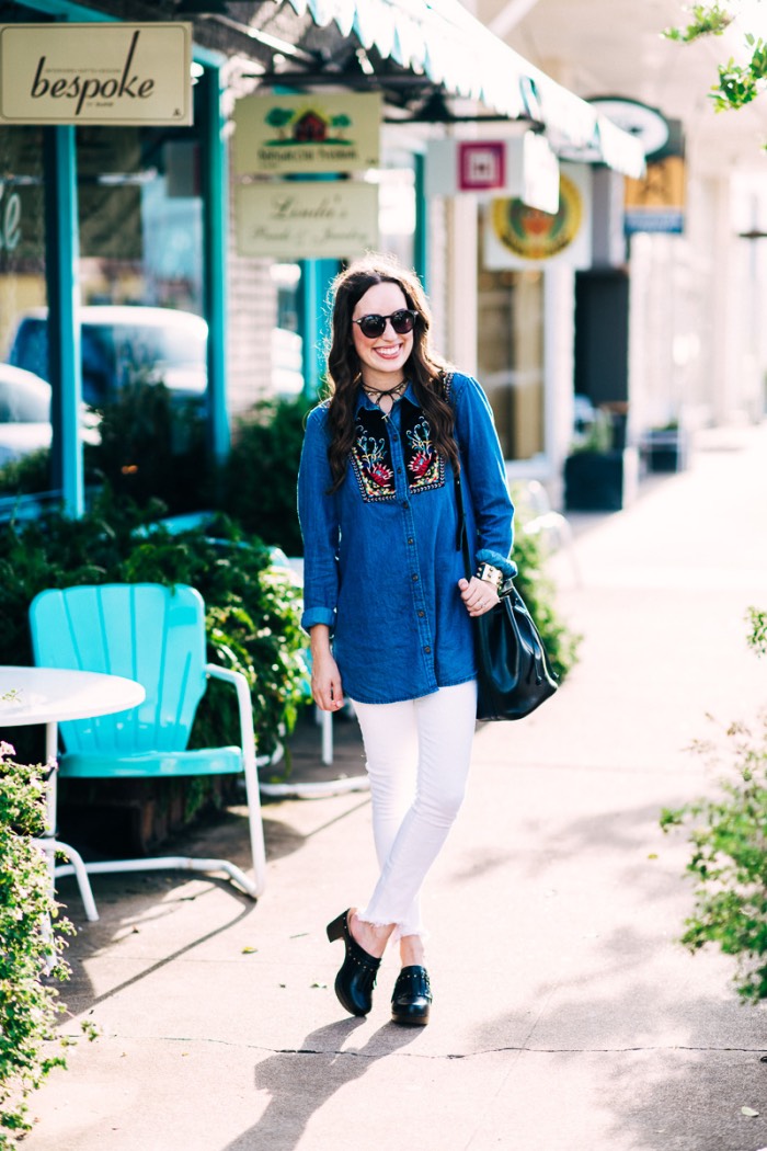 Houston fashion blogger Alice Kerley styles Anthropologie's Murelet Embroidered Chambray Tunic with Dansko Deni Clogs and white true religion jeans.