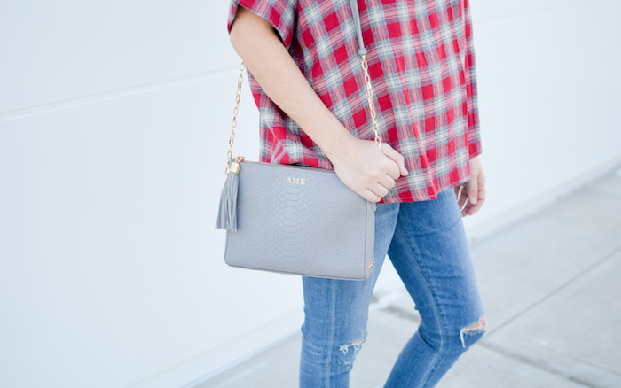 Houston Fashion Blogger Alice Kerley styles a simple fall transitional look with a Madewell red plaid shirt, distressed denim, and a gigi new york handbag.