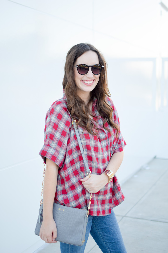 Houston Fashion Blogger Alice Kerley styles a simple fall transitional look with a Madewell red plaid shirt, distressed denim, and a gigi new york handbag.