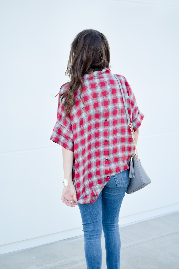 Houston Fashion Blogger Alice Kerley styles a simple fall transitional look with a Madewell red red plaid Madewell shirt, distressed denim, and a gigi new york handbag.