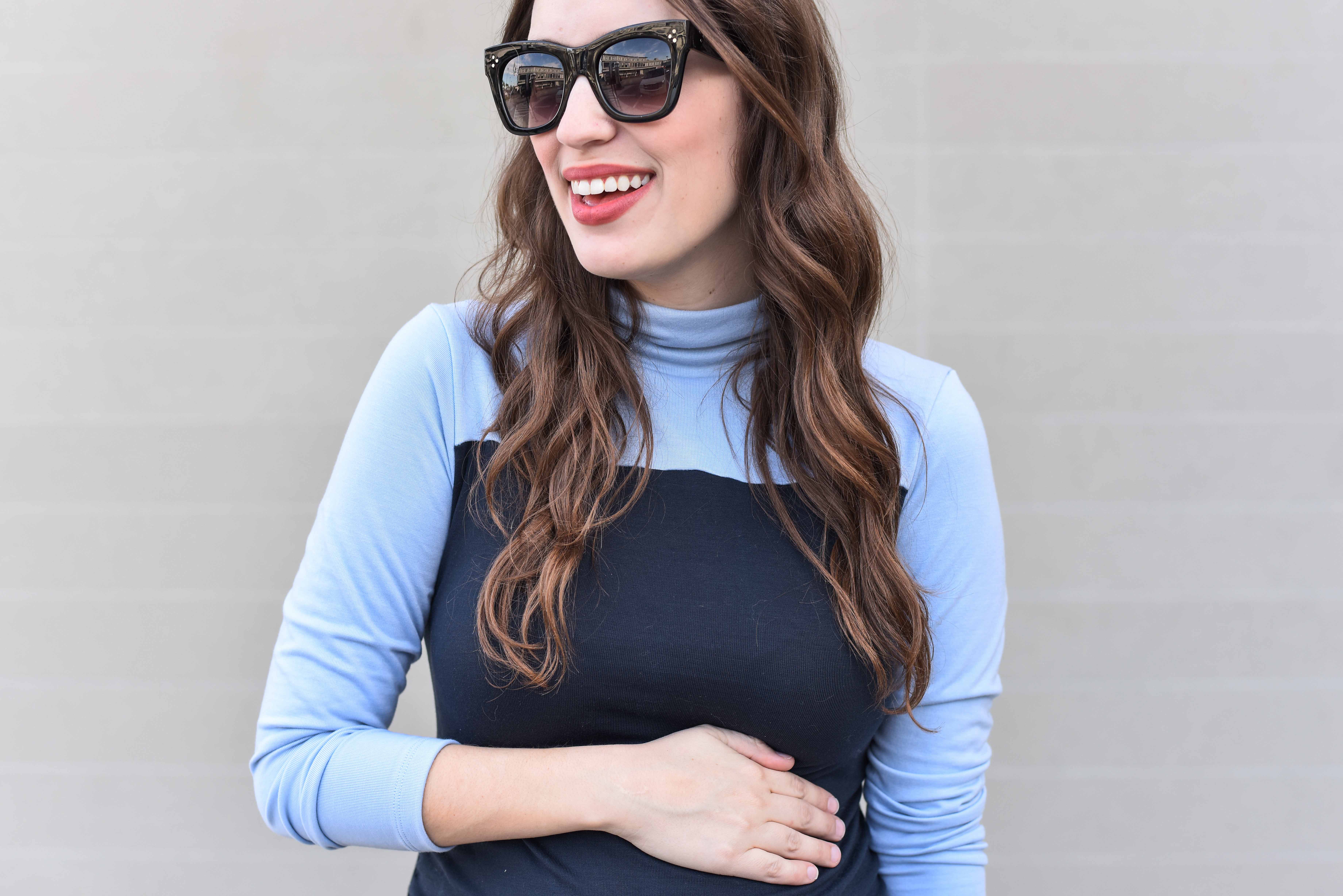 Lone Star Looking Glass, a Texas fashion blow, styles a blue colorblocked maternity dress from Stowaway at 28 weeks pregnant.