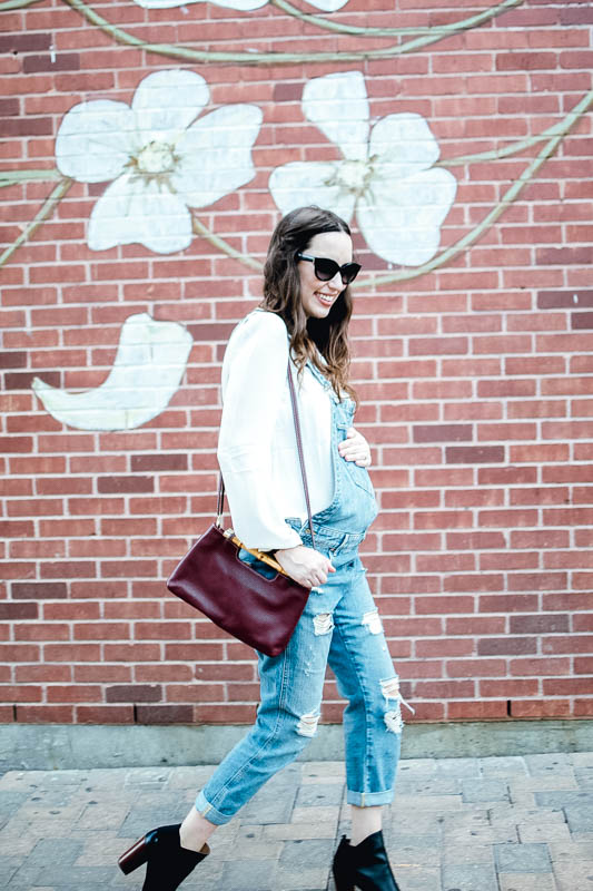 Texas Fashion Blogger styles True Religion overalls with a Seraphine Maternity top for fall.