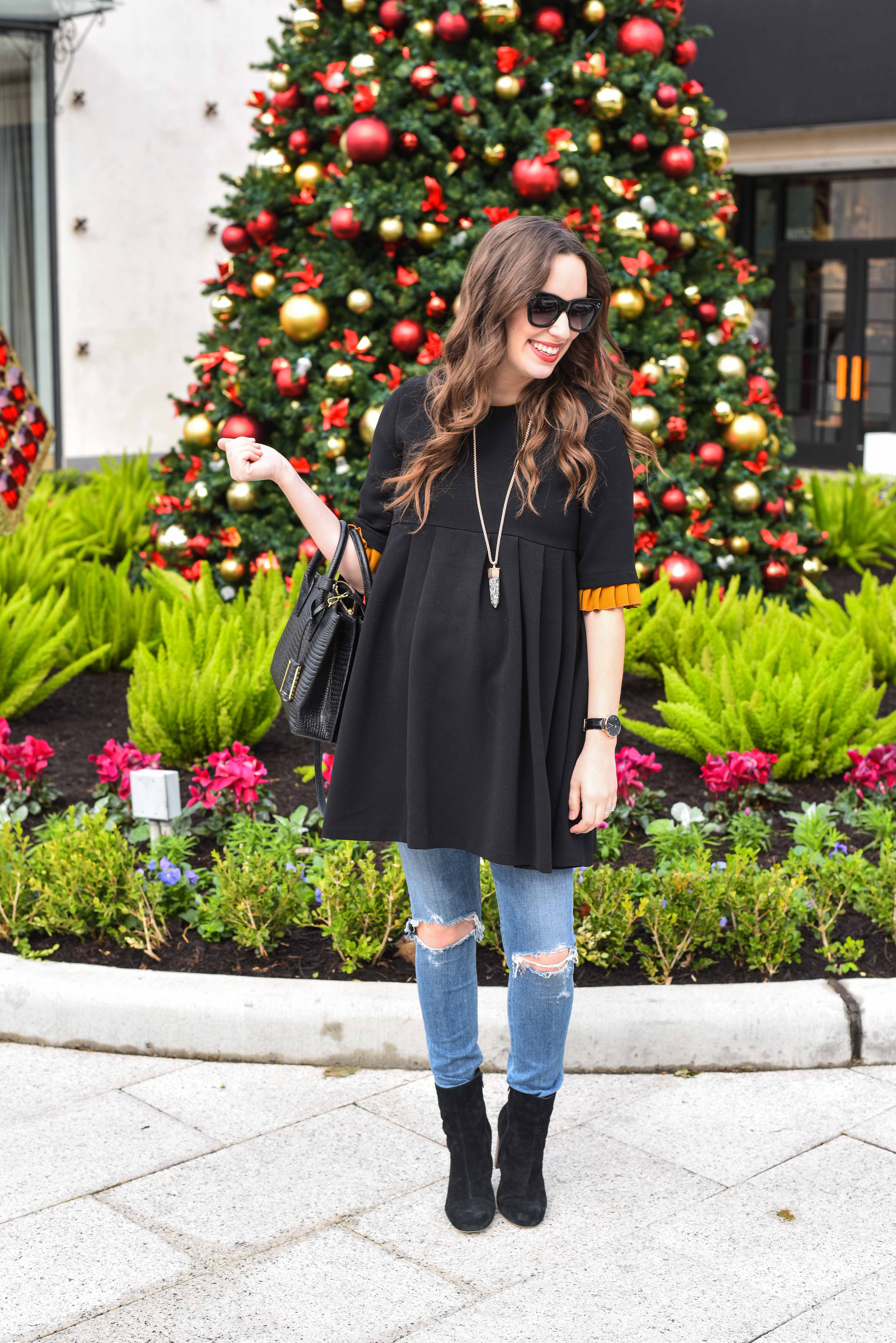 Houston fashion blogger styles a black zara peplum top with citizen maternity skinny jeans and sole society ankle boots for the holidays.