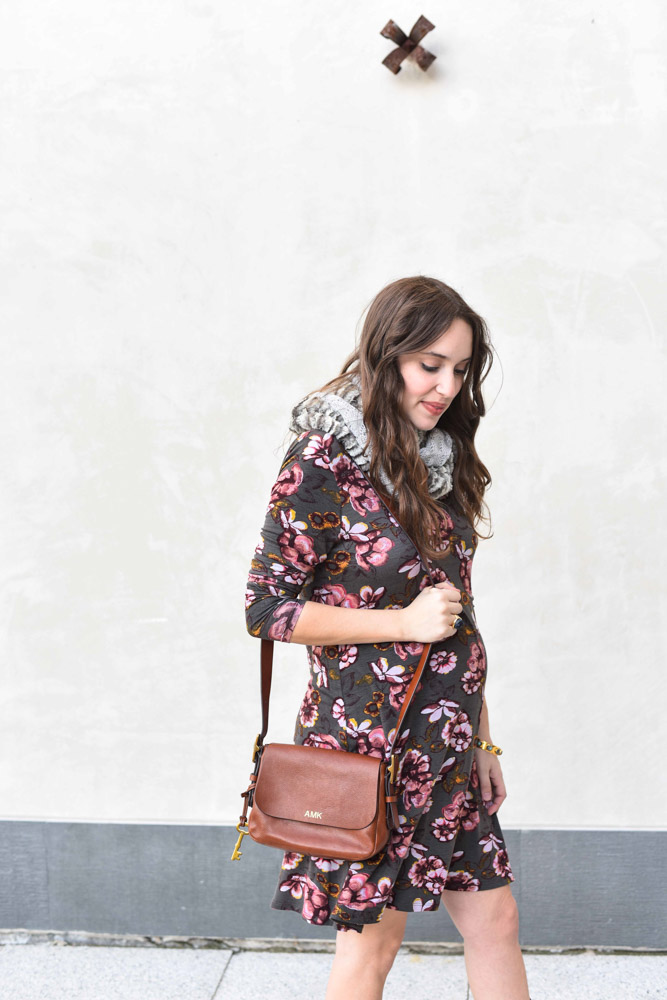 Houston fashion blogger styles a Ruthie Grace Boutique floral print shift dress as a maternity dress for fall. 