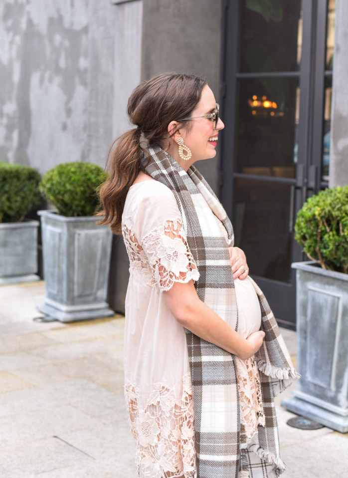 Houston Blogger styles Anthropologie's Magnolia Lace Dress in peach with taupe Elaine Turner boots and a plaid blanket scarf. 