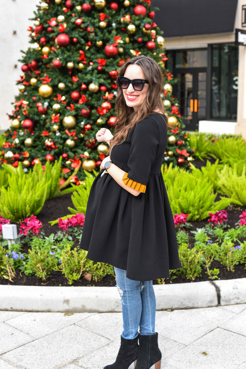 Houston fashion blogger styles a black zara peplum top with citizen maternity skinny jeans and sole society ankle boots for the holidays.