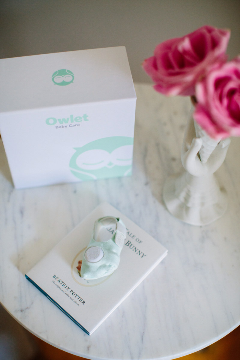Light blue and white baby girl nursery and a review of Owlet Baby Monitors.