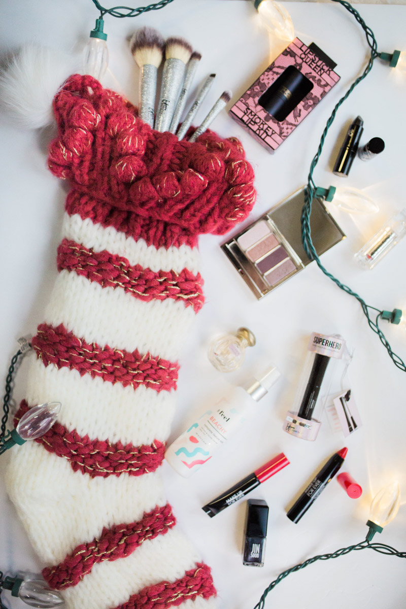 Holiday Beauty Stocking Stuffer Ideas in a red and white Anthropologie Stocking.