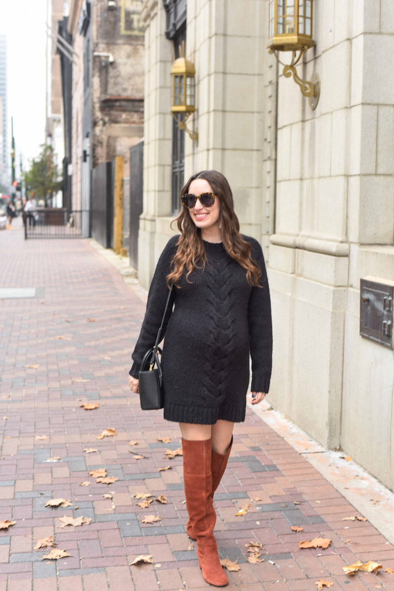 Houston fashion blogger styles a black French Connection sweater dress as a maternity dress with Sole Society over the knee boots and a Dagne Dover handbag.