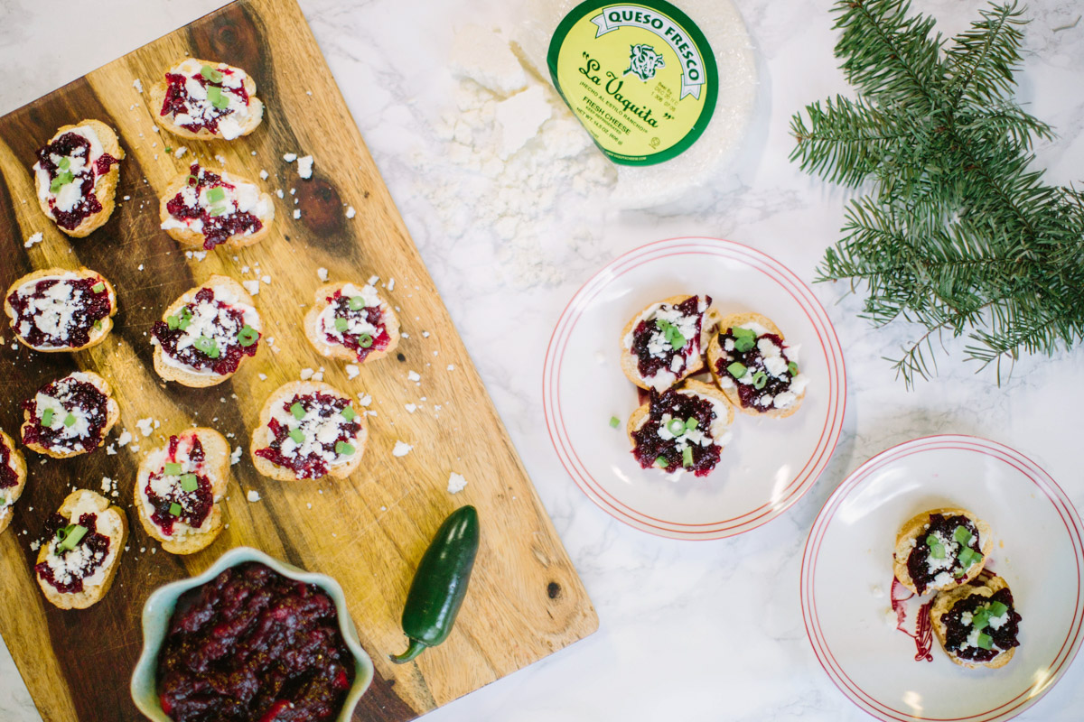 Holiday appetizer idea with a jalapeno cranberry chutney recipe served over cheese and crackers.