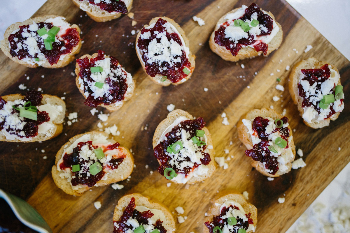 Holiday appetizer idea with a jalapeno cranberry chutney recipe served over cheese and crackers.
