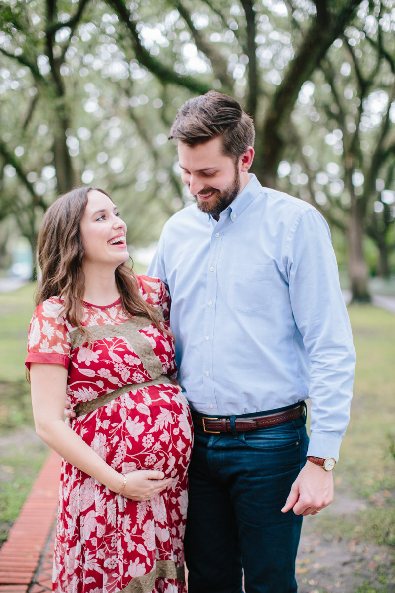Houston, Texas maternity photo shoot, wearing a red maxi dress in the Museum District.