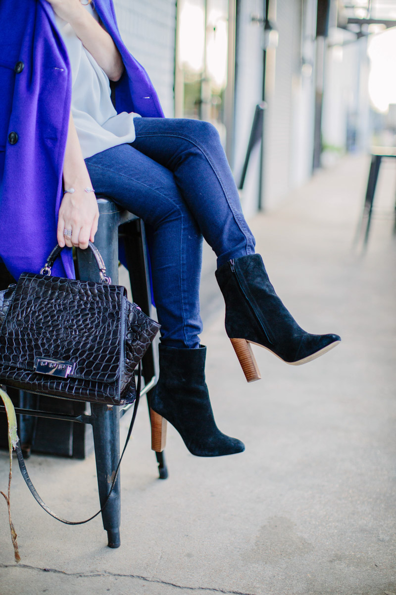 Houston fashion blogger styles a black Zac Posen handbag with Sole Society ankle booties. 