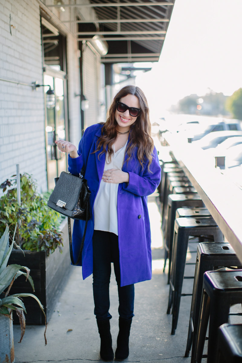 Houston fashion blogger shares winter style outfit inspiration in a JOA blue coat with a black zac posen handbag. 