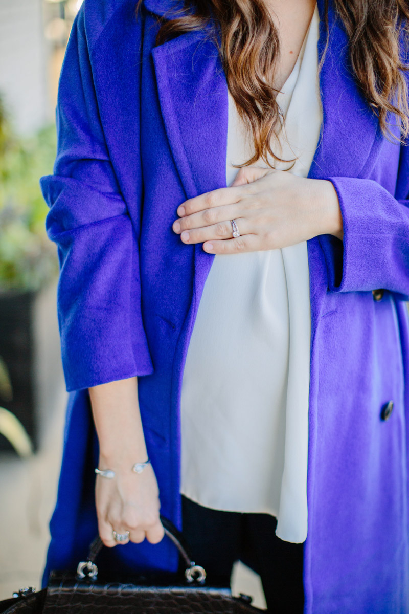 Houston fashion blogger shares winter style outfit inspiration in a JOA blue coat with a black zac posen handbag. 