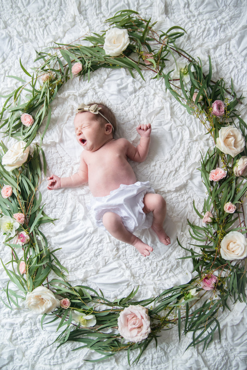 Newborn baby girl photography ideas: cuteheads lace bloomers and flower wreath.
