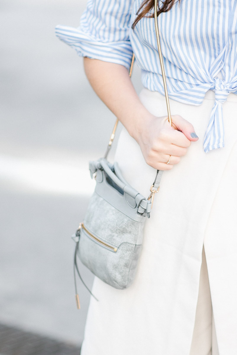 Foley and Corinna blue handbag styled with white culottes.