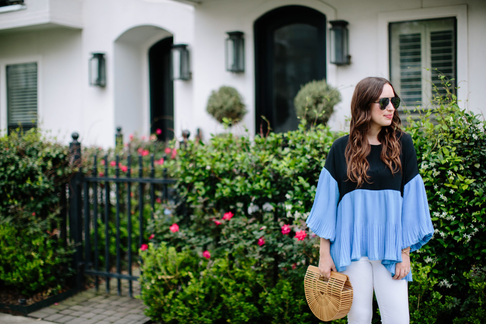 Houston blogger styles an outfit for spring: white true religion jeans, sole society wedges, a blue and black colorblocked chicwish top with a cult gaia handbag.