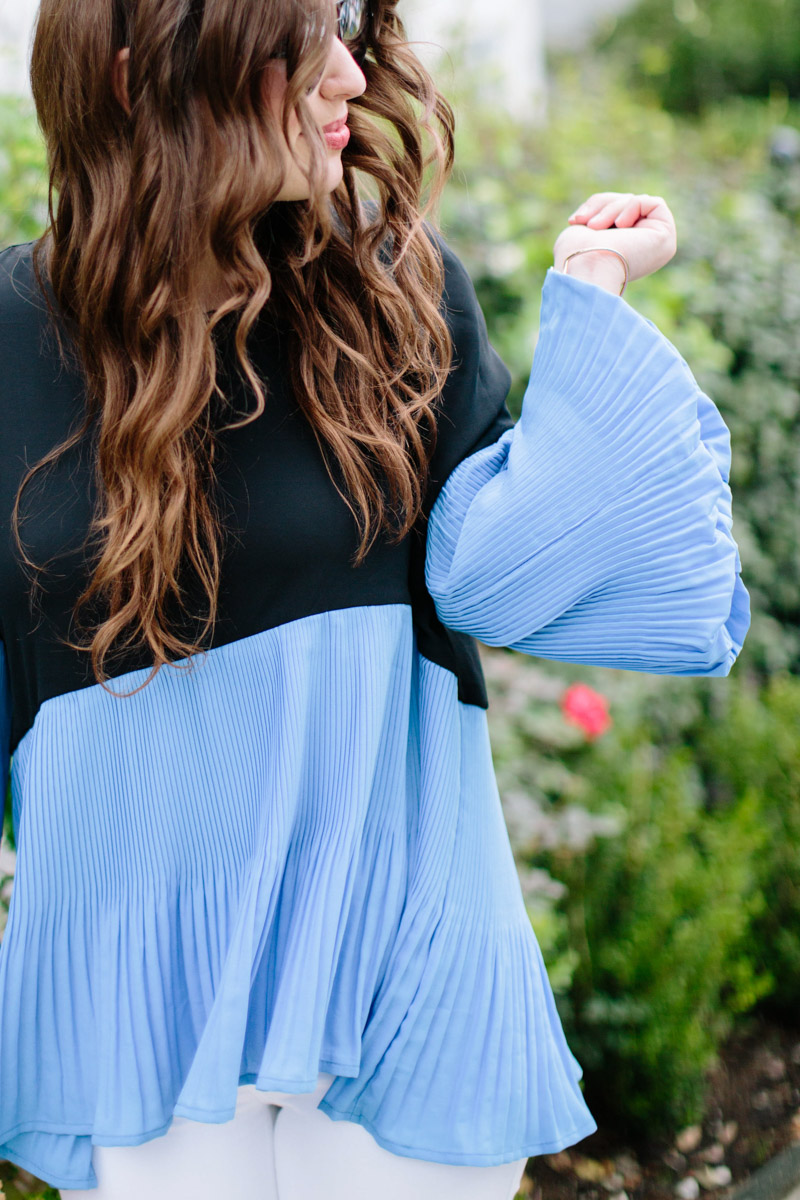 Blue and black color blocked bell sleeve top