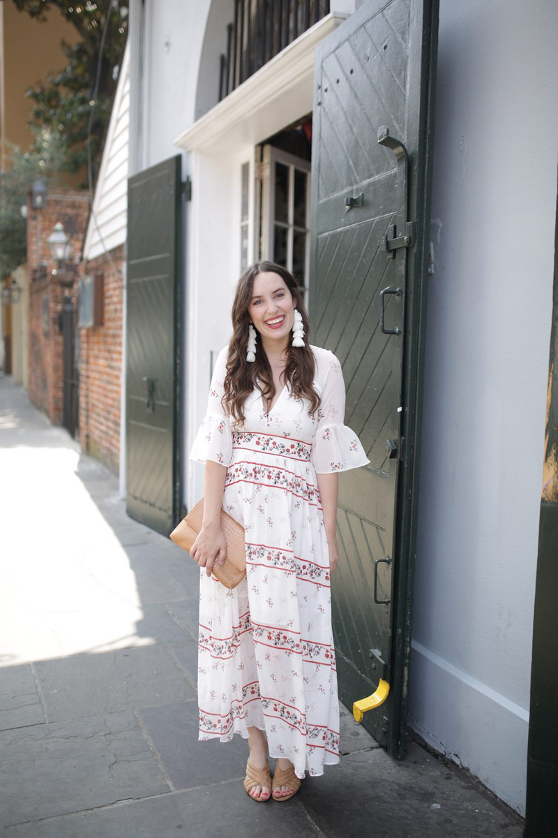 New Orleans fashion in the French Quarter. Blogger styles an Endless Rose red and white maxi dress.