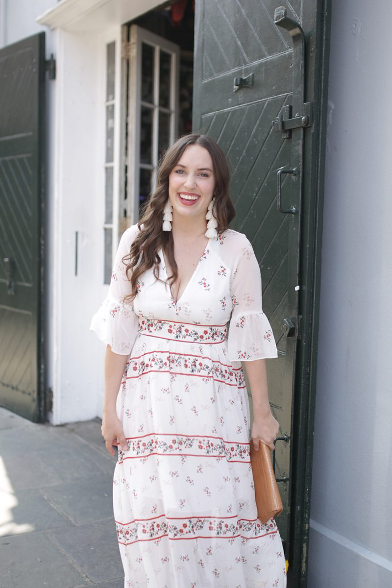 New Orleans fashion in the French Quarter. Blogger styles an Endless Rose red and white maxi dress.