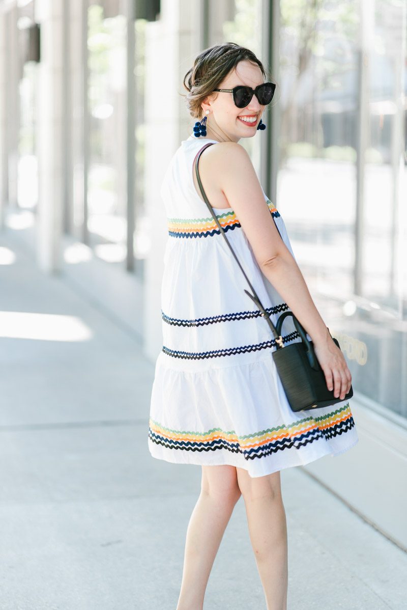 Houston fashion blogger styles a White ricrac Anthropologie Lunedi Flounced Dress