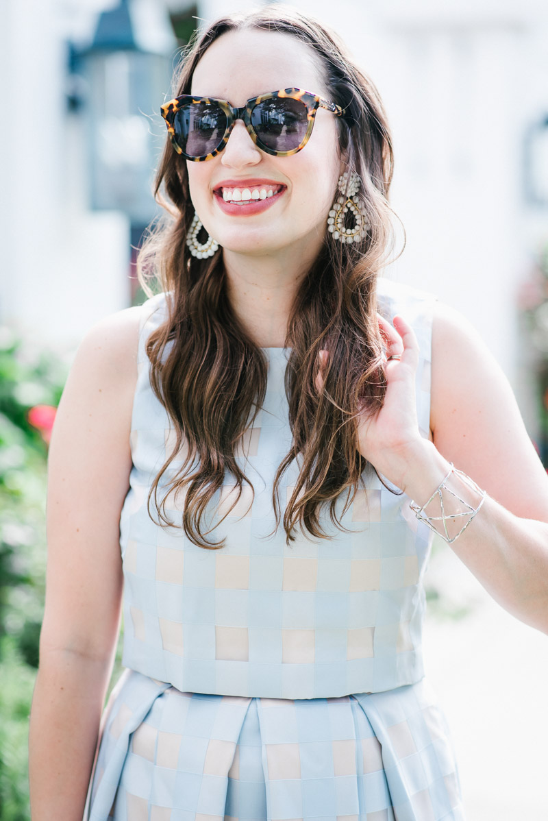 Houston fashion blogger styles white lisi lerch earrings with a blue dress for summer.