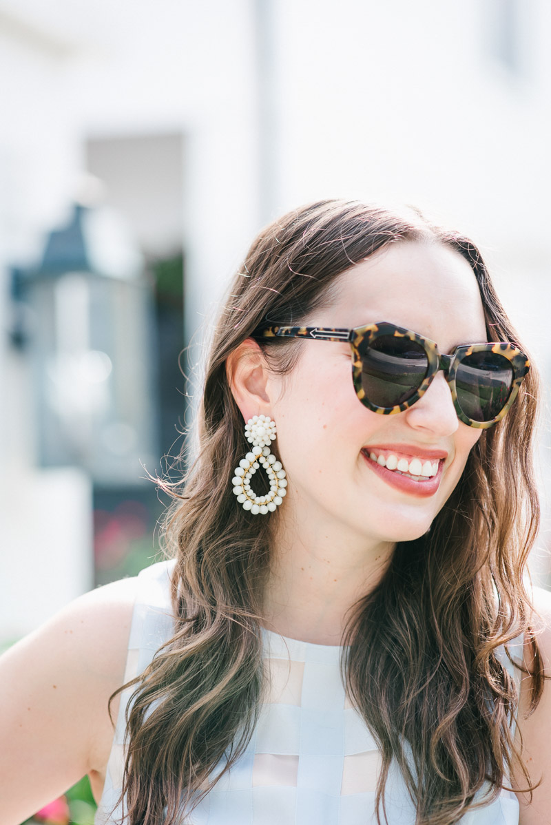 Houston fashion blogger styles white lisi lerch earrings with a blue dress for summer.