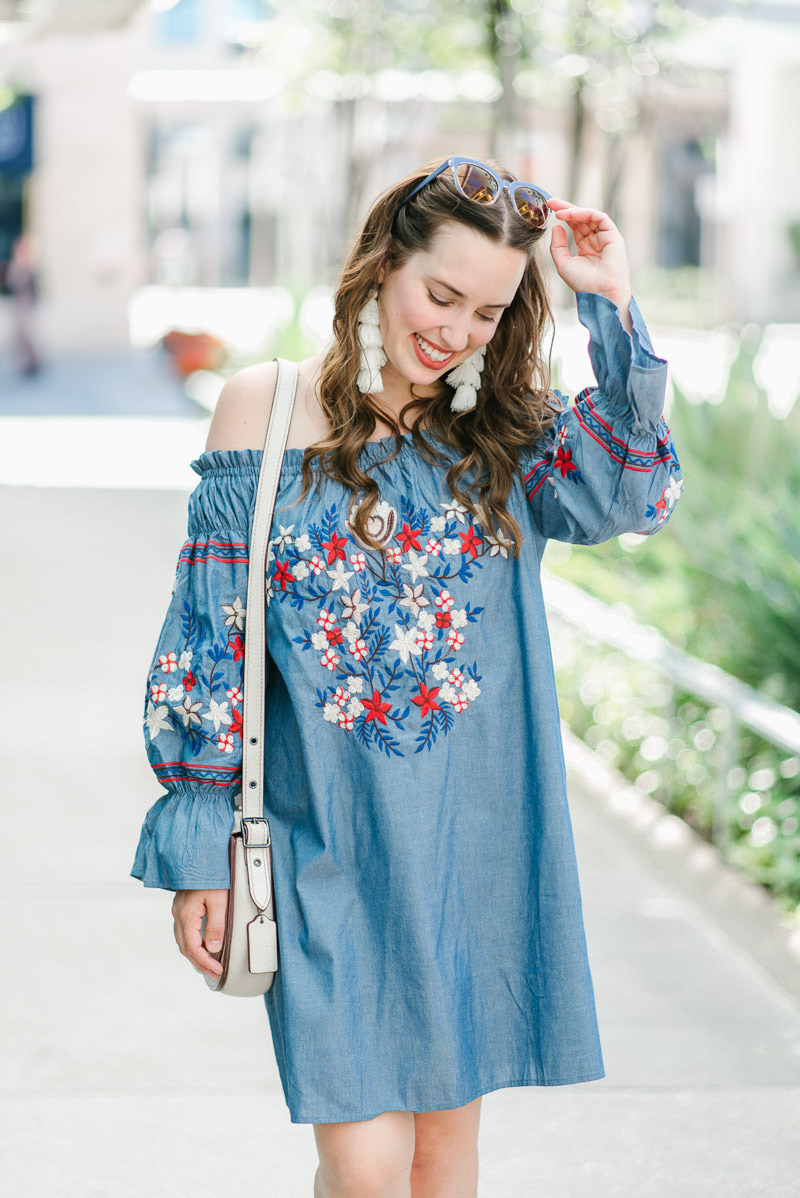 Houston fashion blogger styles a red white and blue off the shoulder dress.
