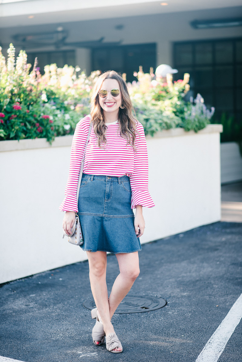 Texas blogger styles a Draper James denim skirt with a red striped bell sleeve top.