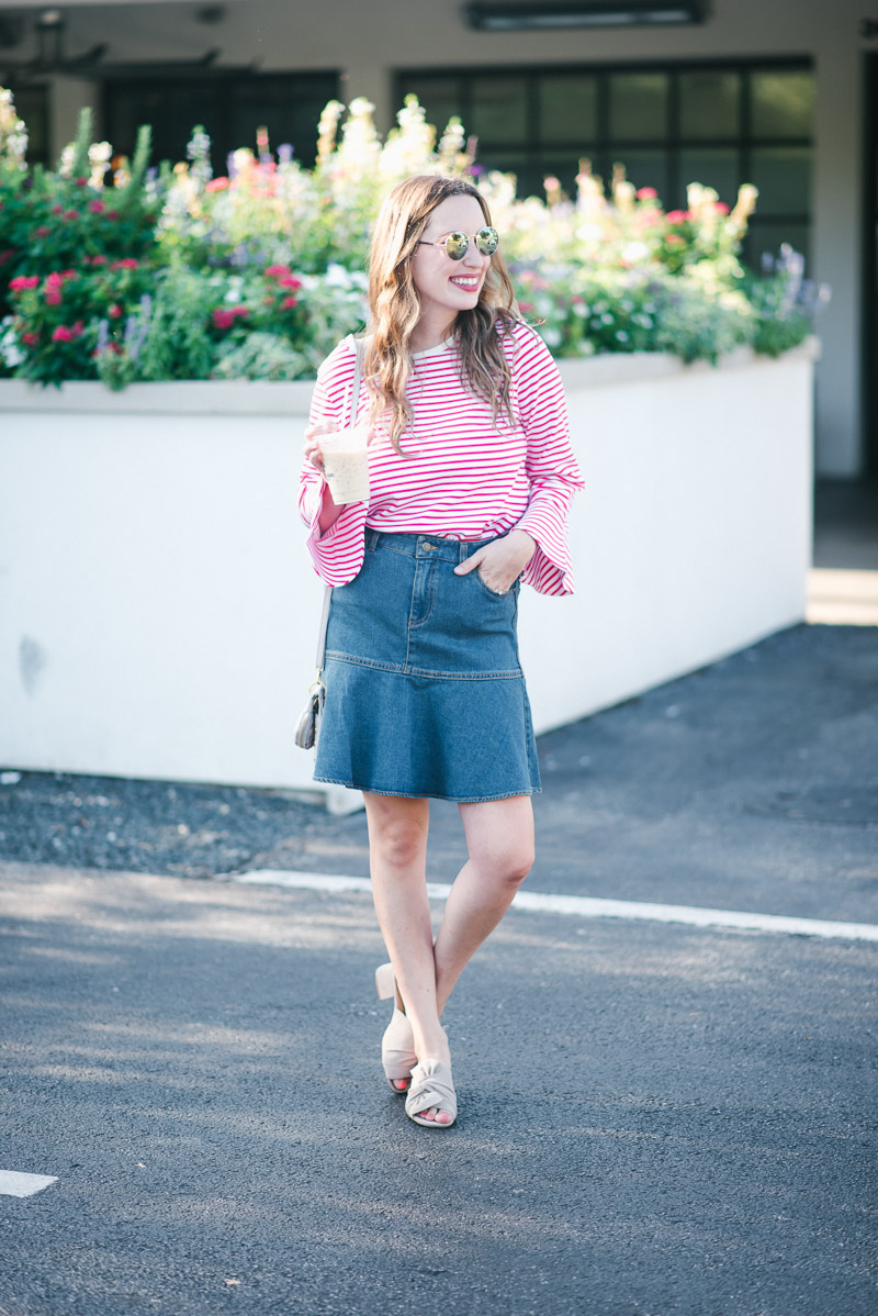 Texas blogger styles a Draper James denim skirt with a red striped bell sleeve top.