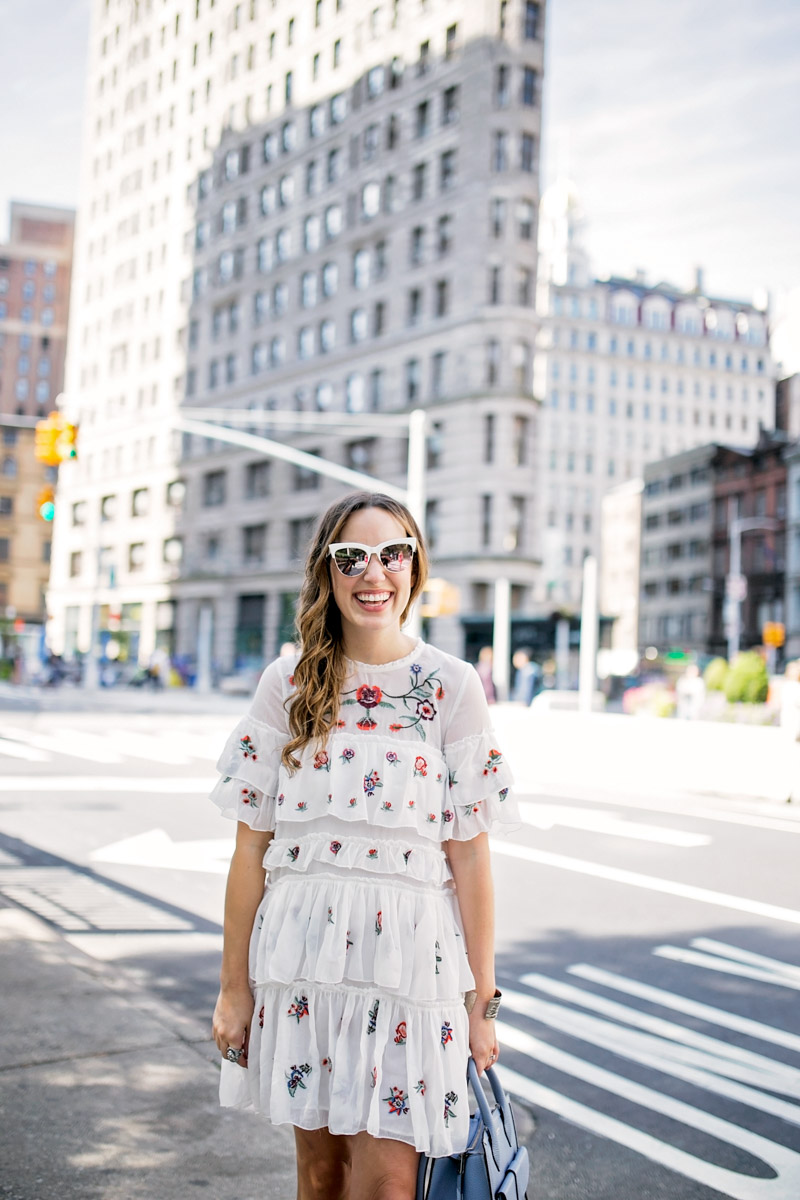 Texas blogger takes on New York Fashion Week in a Tiered Embroidered Floral Dress.