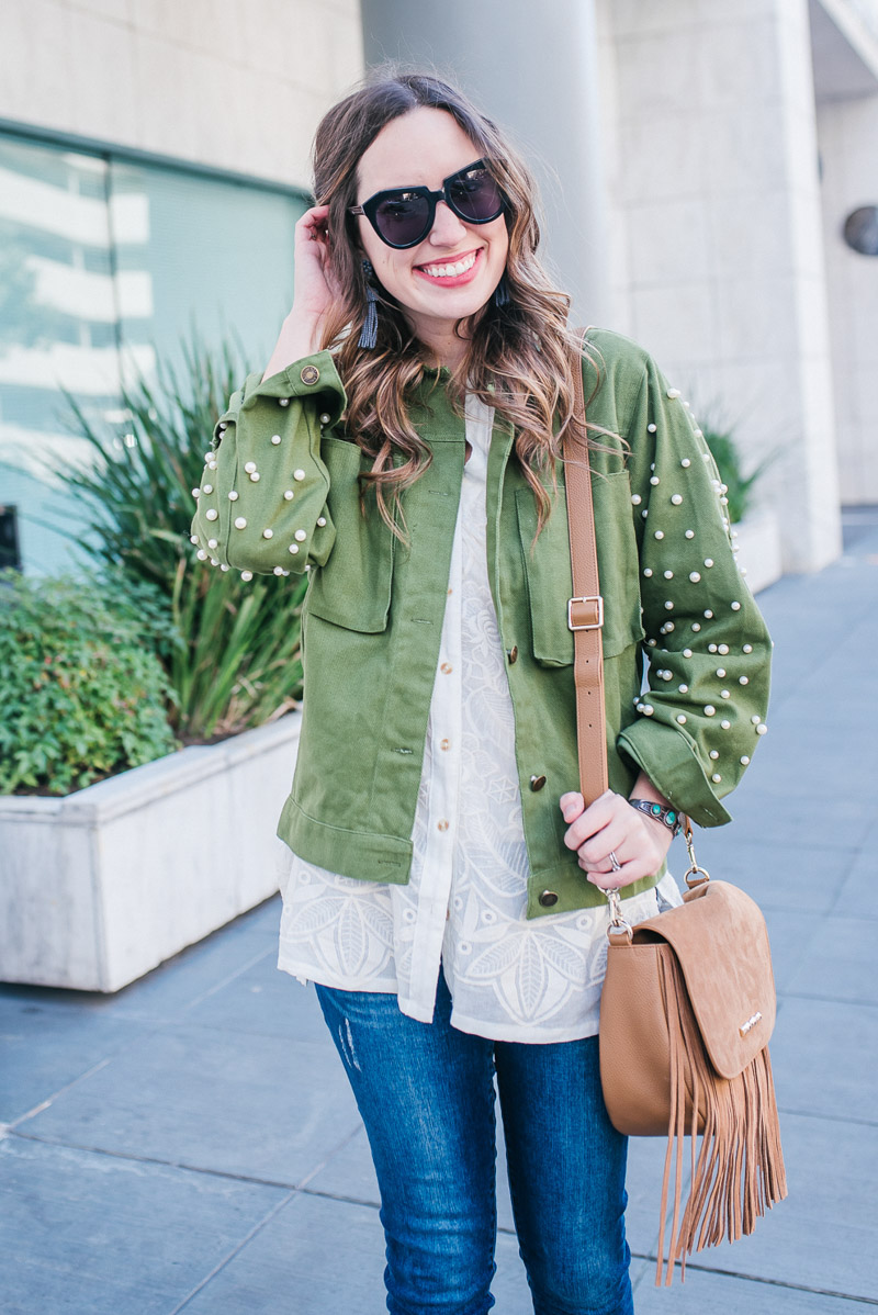 Spring layering ideas: style a green pearl sleeve anorak jacket with a white lace Anthropologie button down.