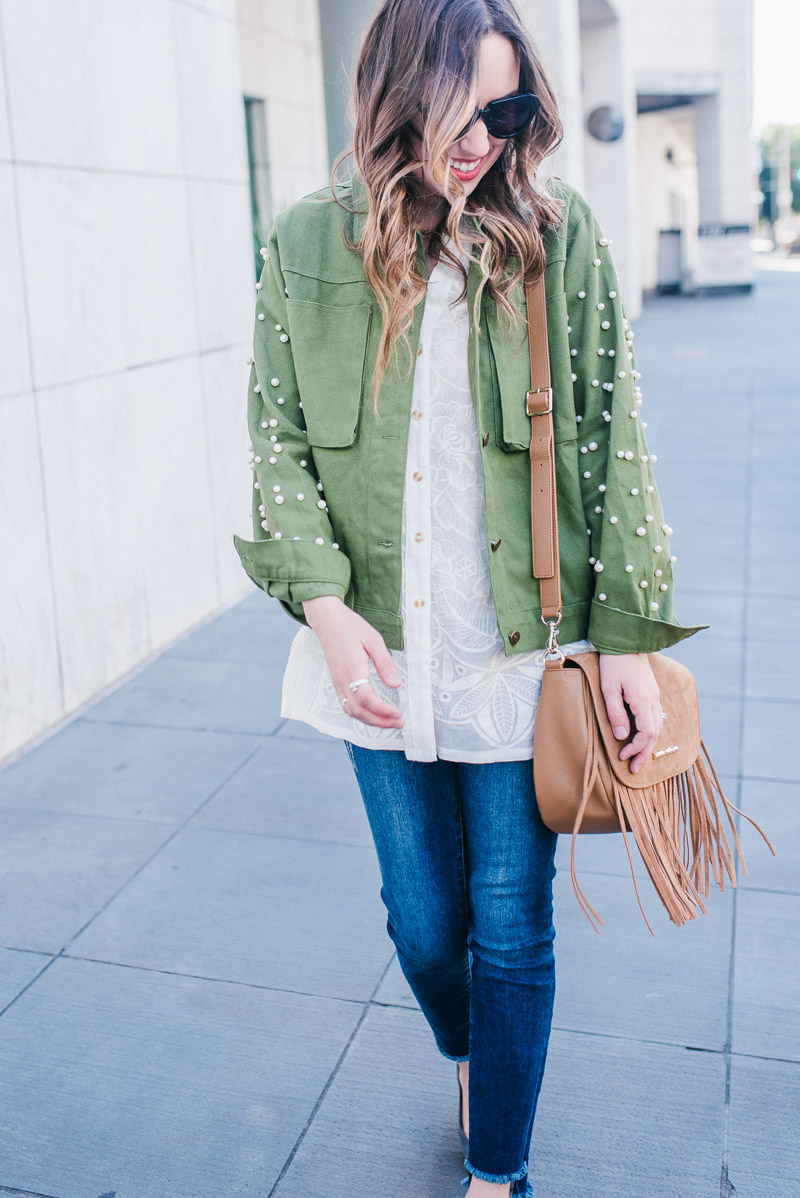 Spring layering ideas: style a green pearl sleeve anorak jacket with a white lace Anthropologie button down.