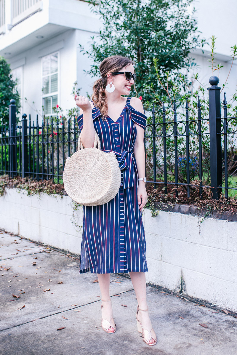 Spring outfit inspiration: Navy and red striped sundress paired with a Clare V Alice Bag and Seychelles Wedges
