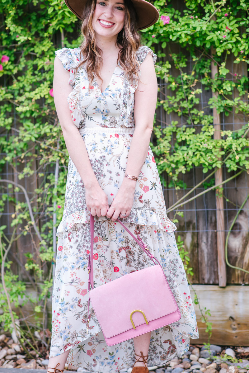 Houston fashion blogger styles the Fossil Finley bag in pink. 