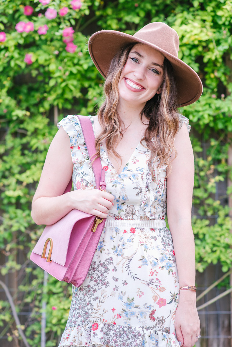 Houston fashion blogger styles the Fossil Finley bag in pink. 