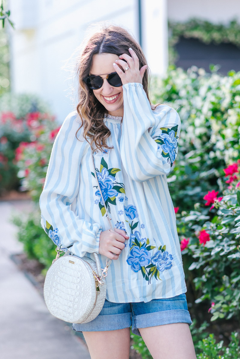 Houston fashion blogger styles Anthropologie's embroidered and striped blouse for spring.