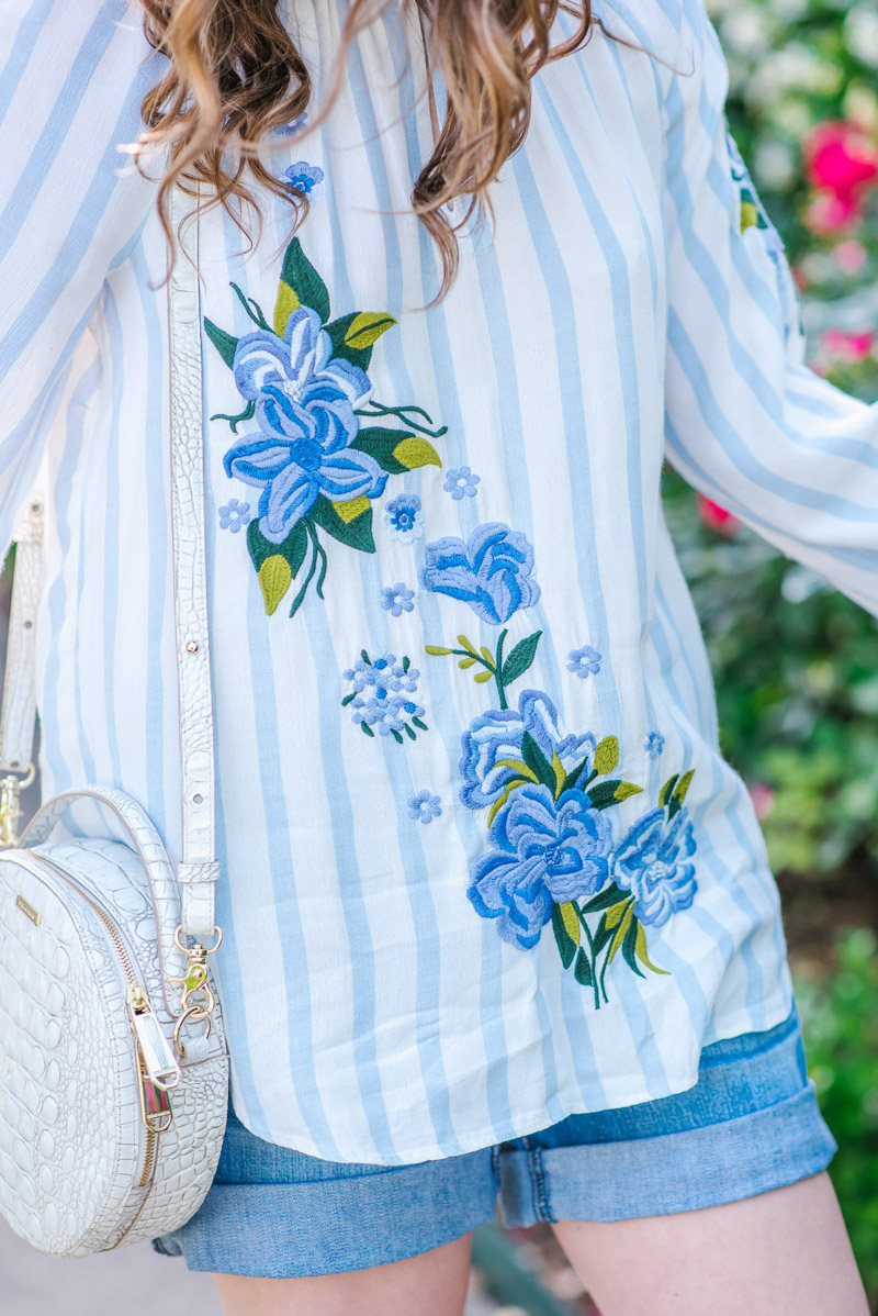 Houston fashion blogger styles Anthropologie's embroidered and striped blouse for spring.
