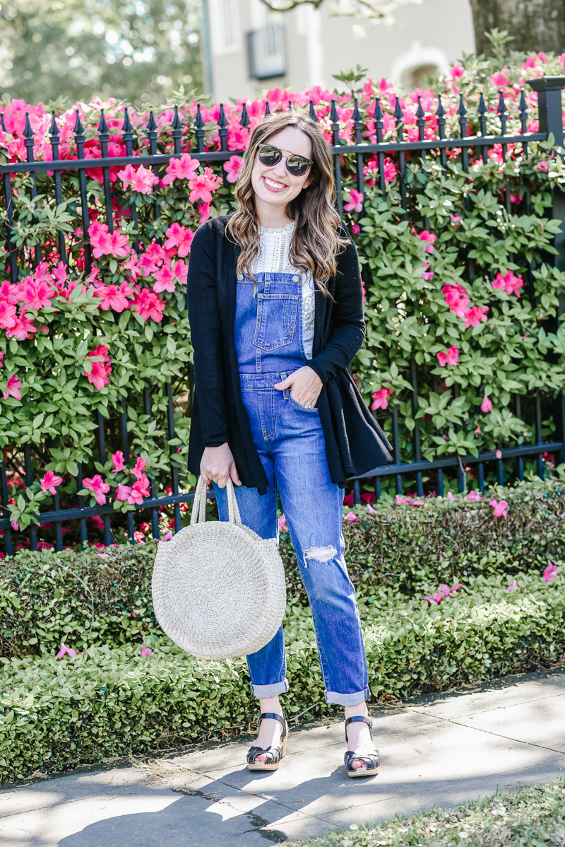 Houston fashion blogger styles Levi's Overalls with an Anthropologie lace top and Joseph A sweater for spring.
