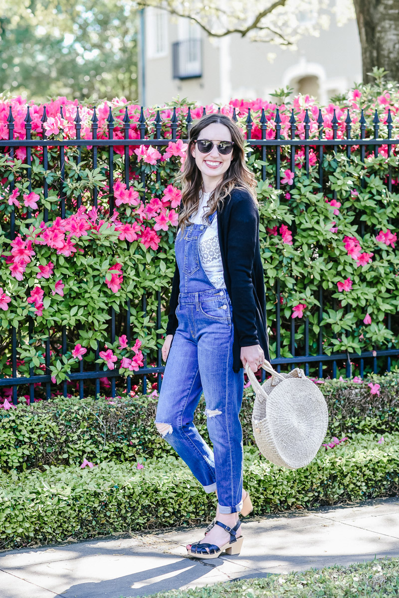 Houston fashion blogger styles Levi's Overalls with an Anthropologie lace top and Joseph A sweater for spring.