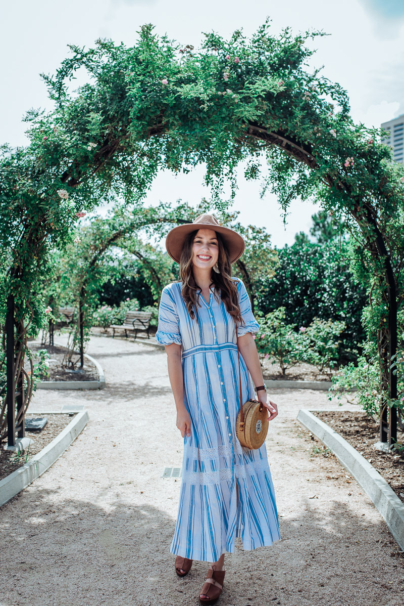 Houston blogger styles blue loveshackfancy dress for spring.