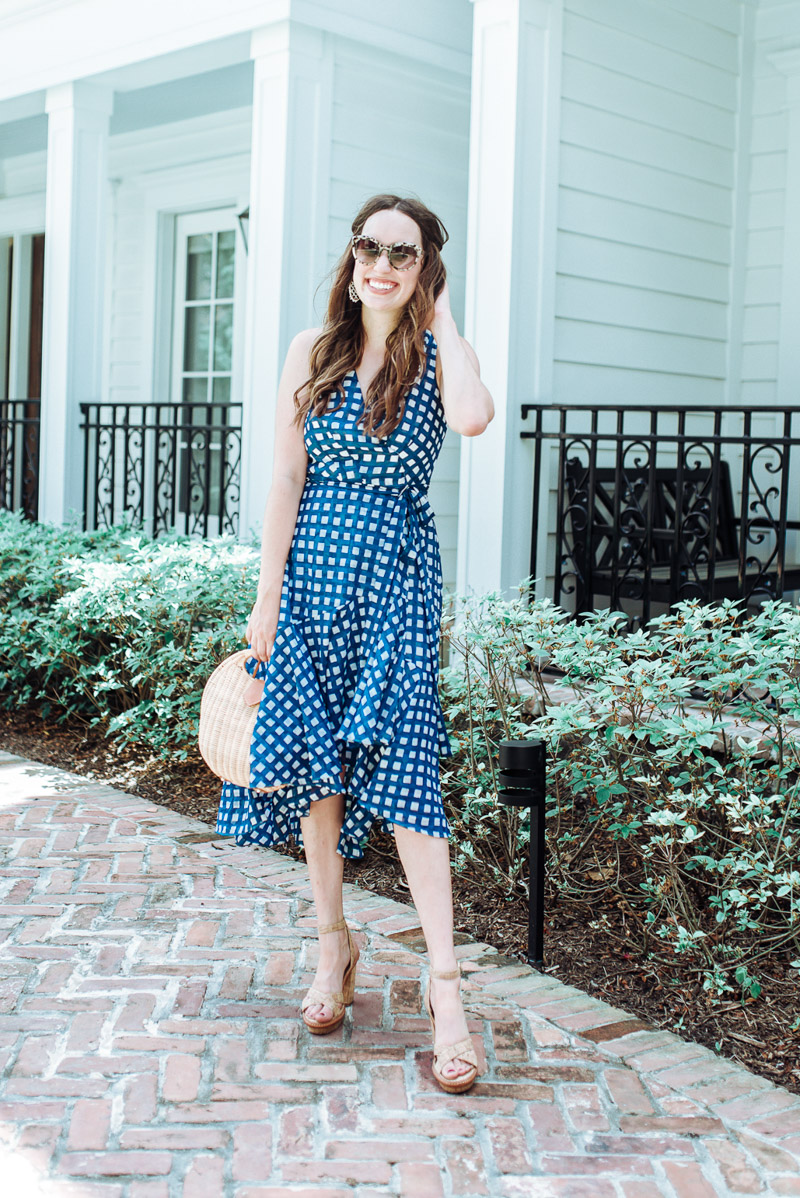 Houston fashion blogger styles a blue Eliza J high-low wrap dress. 