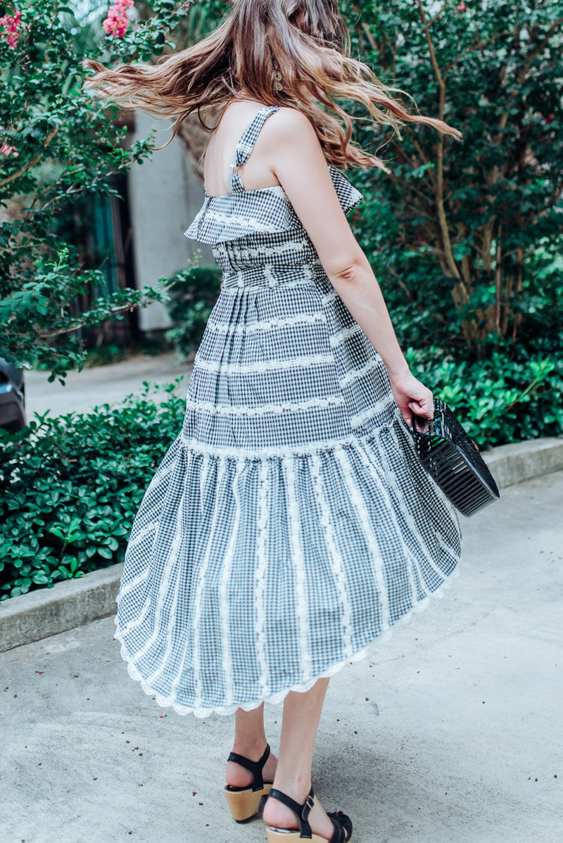 Houston fashion blogger styles the Adelyn Rae Belle Midi Dress in gingham lace for Summer.