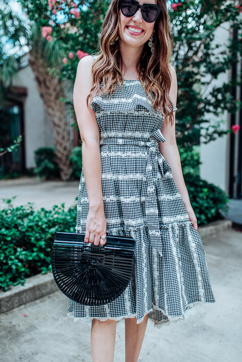 Houston fashion blogger styles the Adelyn Rae Belle Midi Dress in gingham lace for Summer.