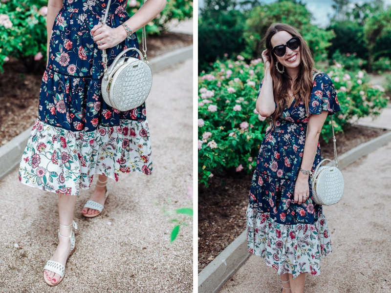 Houston blogger styles a navy floral Eliza J flutter sleeve dress with white jack rogers for summer.