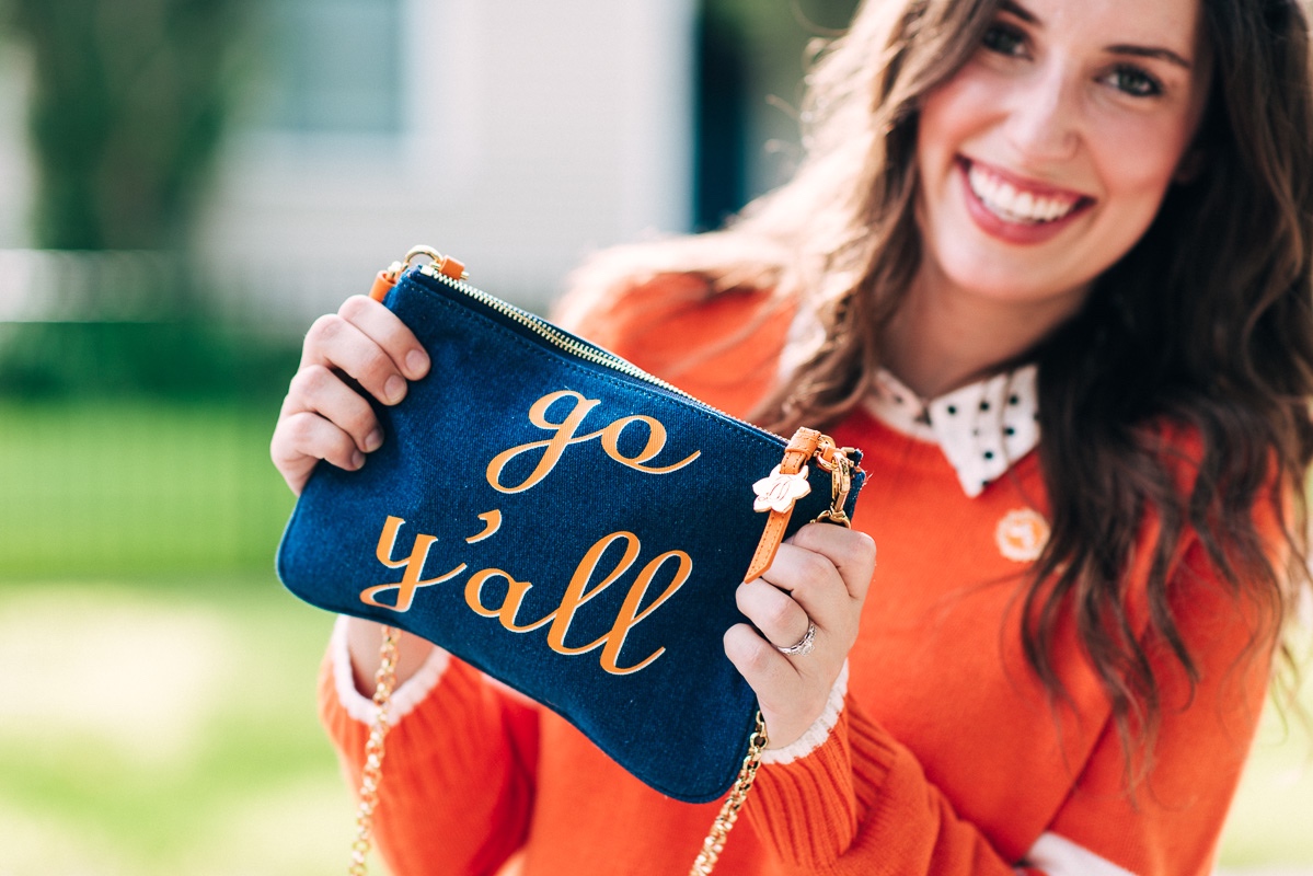 The Draper James Go Y'all Envelope Clutch in Tennessee Orange  | Stylish Southern Tailgate featured by top Houston life and style blog, Lone Star Looking Glass