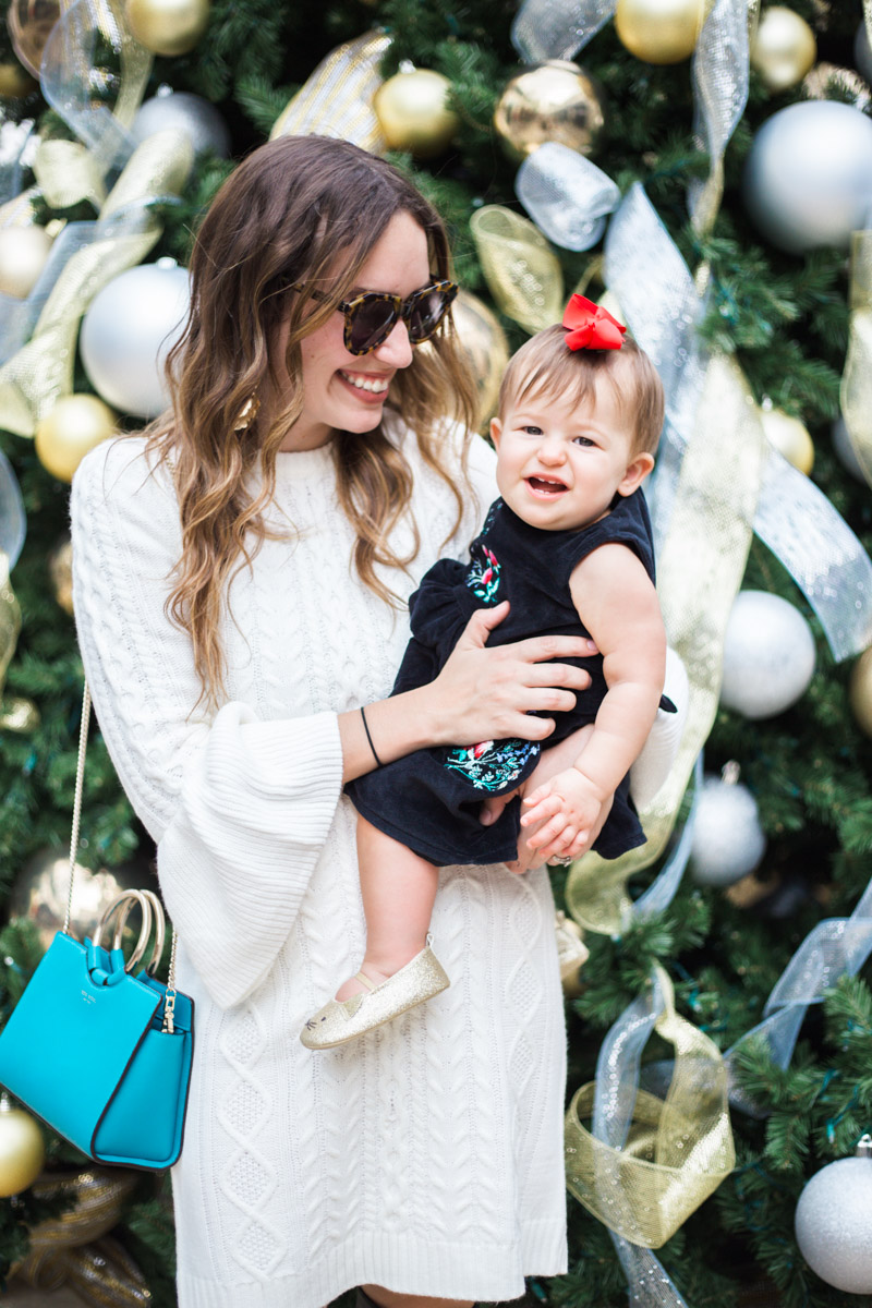 Mother Daughter Holiday Dresses - Eliza J White Sweater Dress with a black Carter's embroidered floral dress. - New Family Holiday Traditions with Our Newest Addition featured by top Houston lifestyle blog, Lone Star Looking glass
